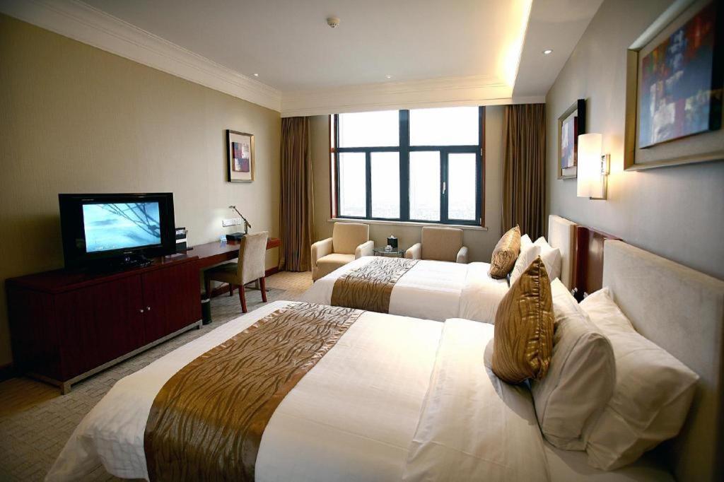 Qingdao Blue Horizon Hotel Licang Exterior foto